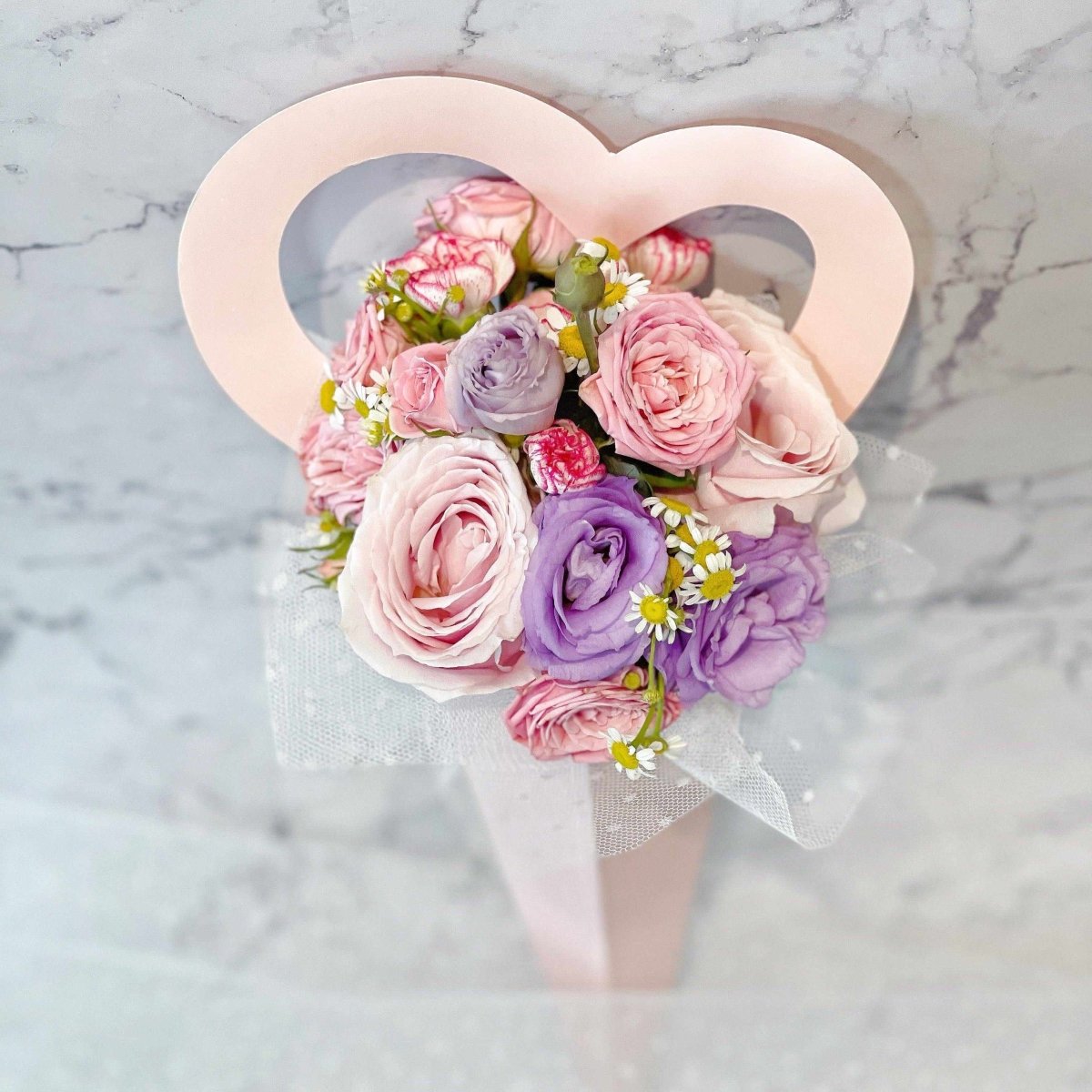 http://rainbowly.com/cdn/shop/products/fresh-flower-bouquet-heart-fleur-seasonal-picksvaries-daily-389662_1200x1200.jpg?v=1668407127